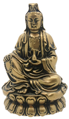 Kwan Yin Goddess sitting in a Lotus Flower